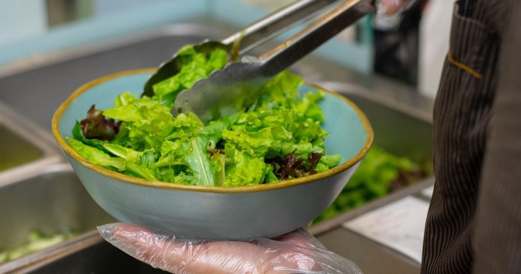 Fresh green salad bowl for a PCOS diet plan